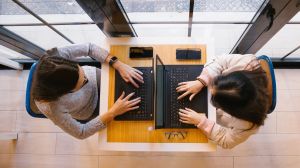 women on laptops