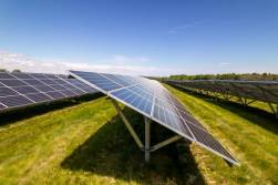 Photograph of a field of solar panels.