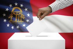 georgia flag behind ballot box